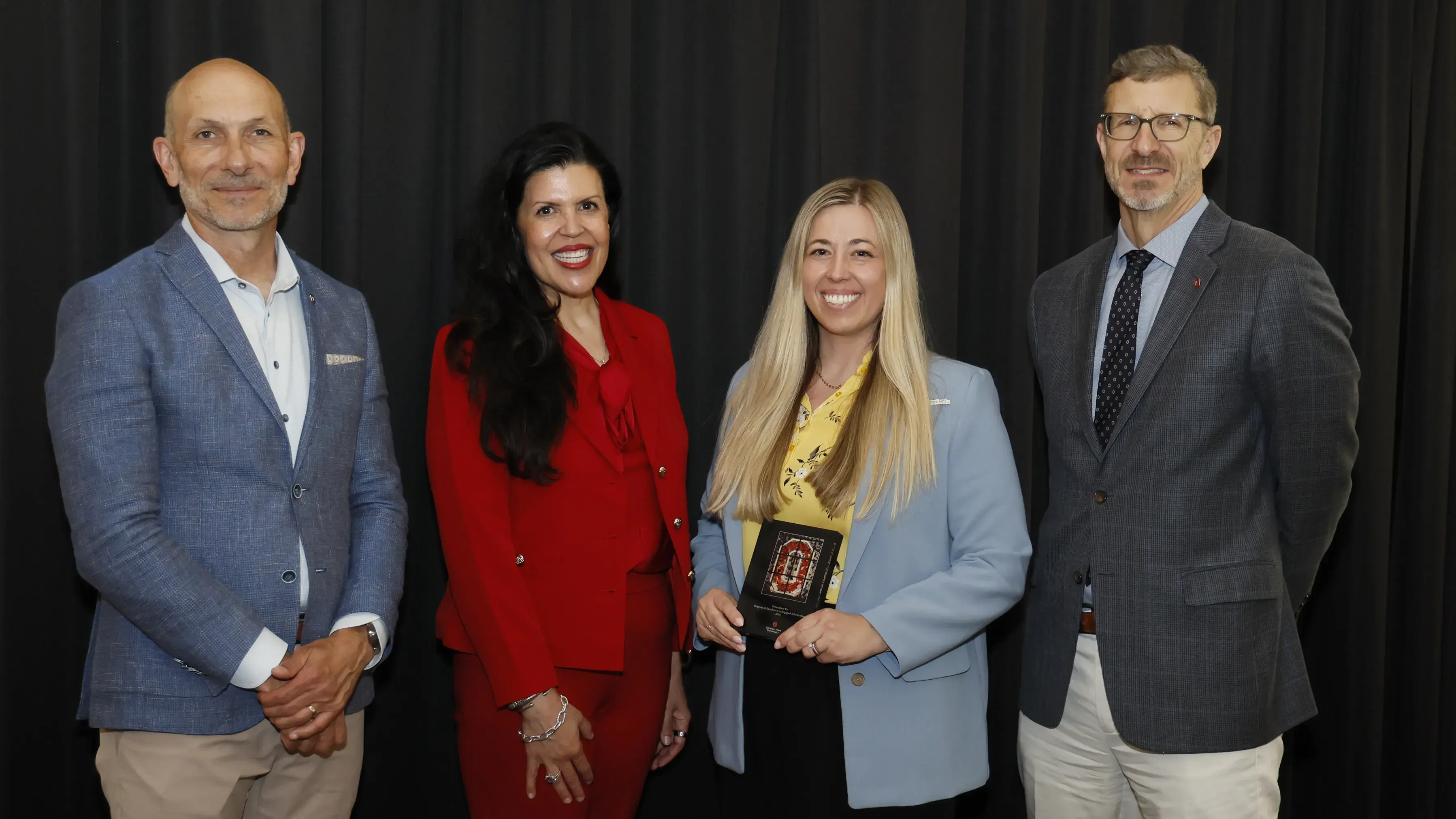 Dr. Kelsey Schmuhl receives Program of Excellence award from The Ohio State University Office of Outreach and Engagement