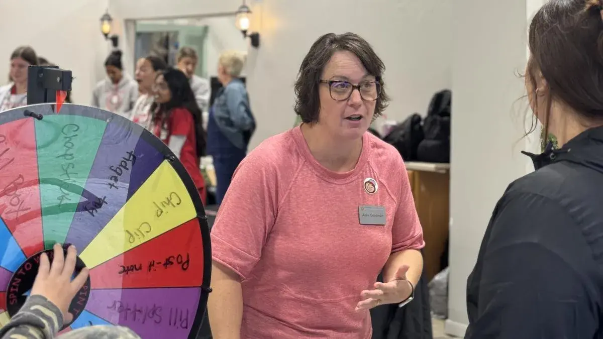 Generation Rx team member, Anne Goodman, interacts with community members at Farm Science Review